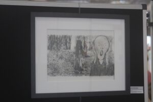 Bild eines Rahmens mit einer Zeichnung des "Schrei" von Edvard Munch.