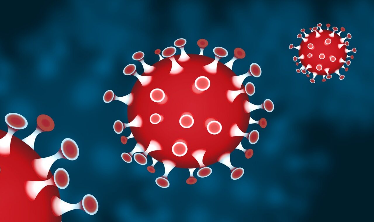 Abstrakte Darstellung von Coronaviruspartikeln auf blauem Hintergrund.