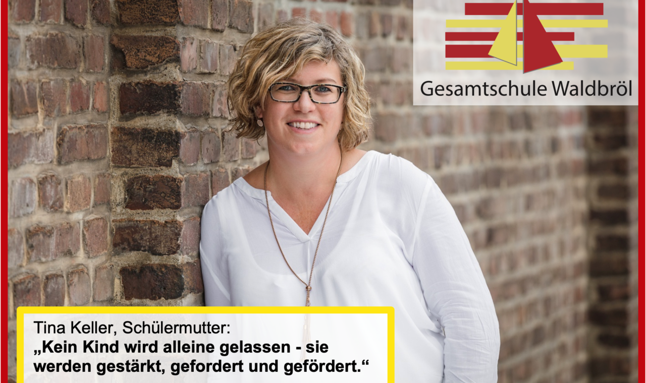 Frau steht vor einer Ziegelwand und spricht über die Förderung von Kindern.