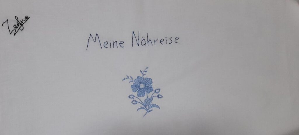 Titel "Meine Naturreise" mit blauer Blumenillustration.